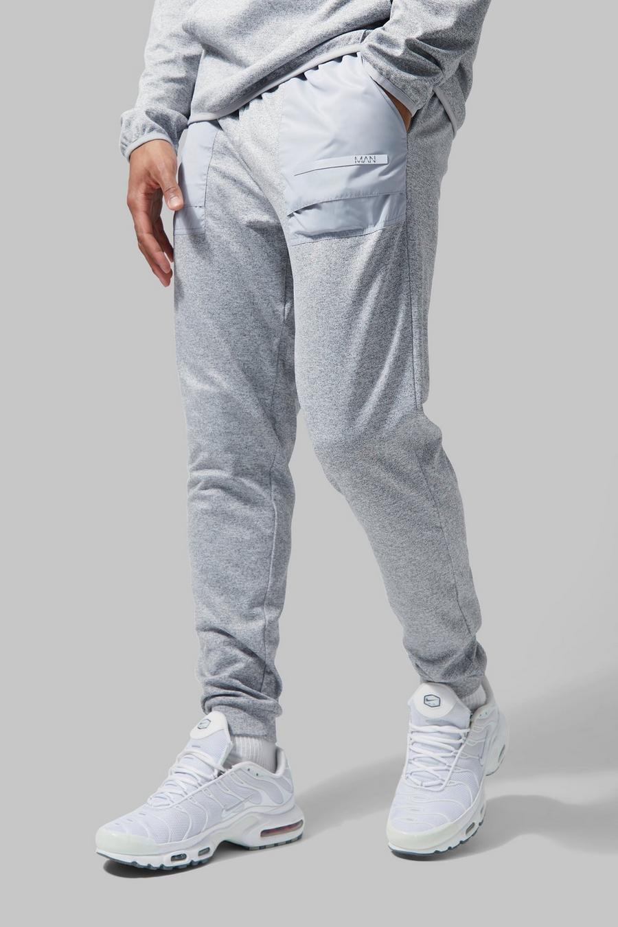 Pantalón deportivo MAN Active jaspeado ajustado, Light grey grigio image number 1