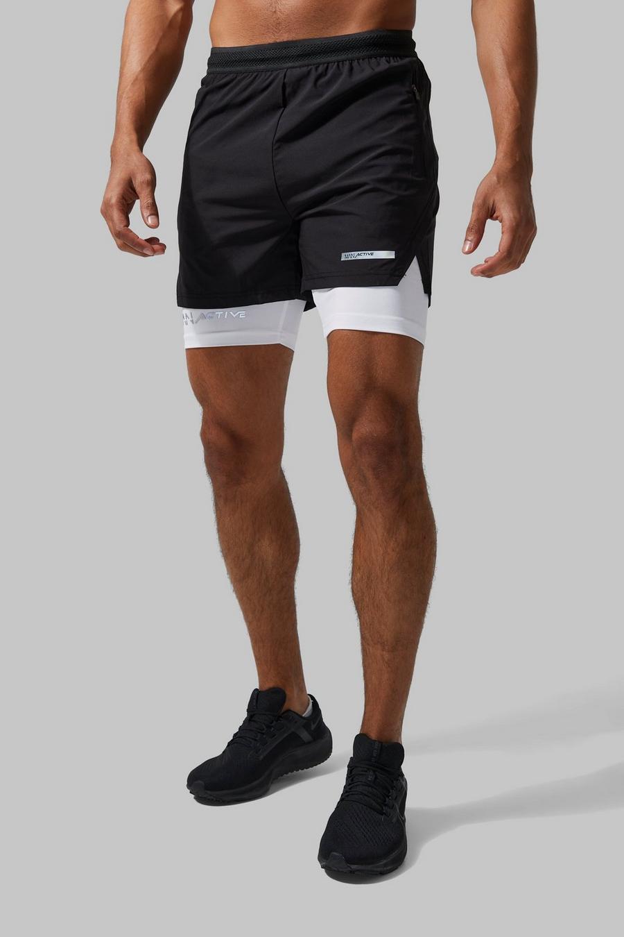 Man Active 2-in-1 Shorts mit geteiltem Saum, Black image number 1