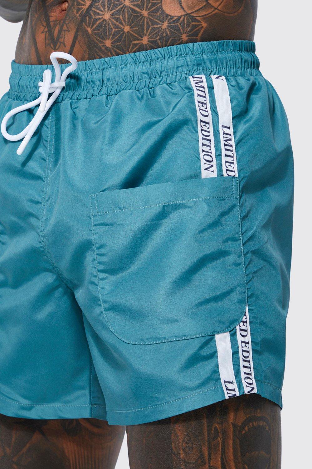 Calvin Klein medium length swim shorts in blue