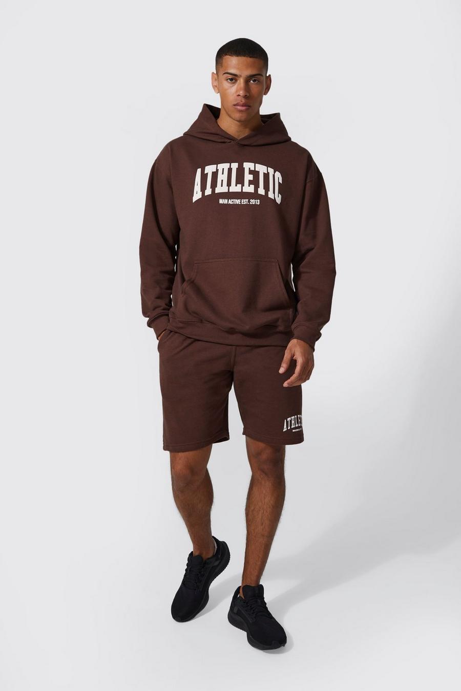 Chocolate brown Man Active Oversized Athletic Short Tracksuit image number 1