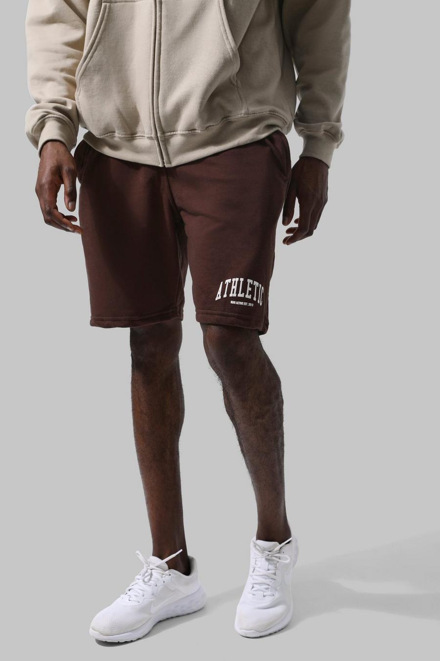 Chocolate brown Man Active Overdye Athletic Shorts image number 1