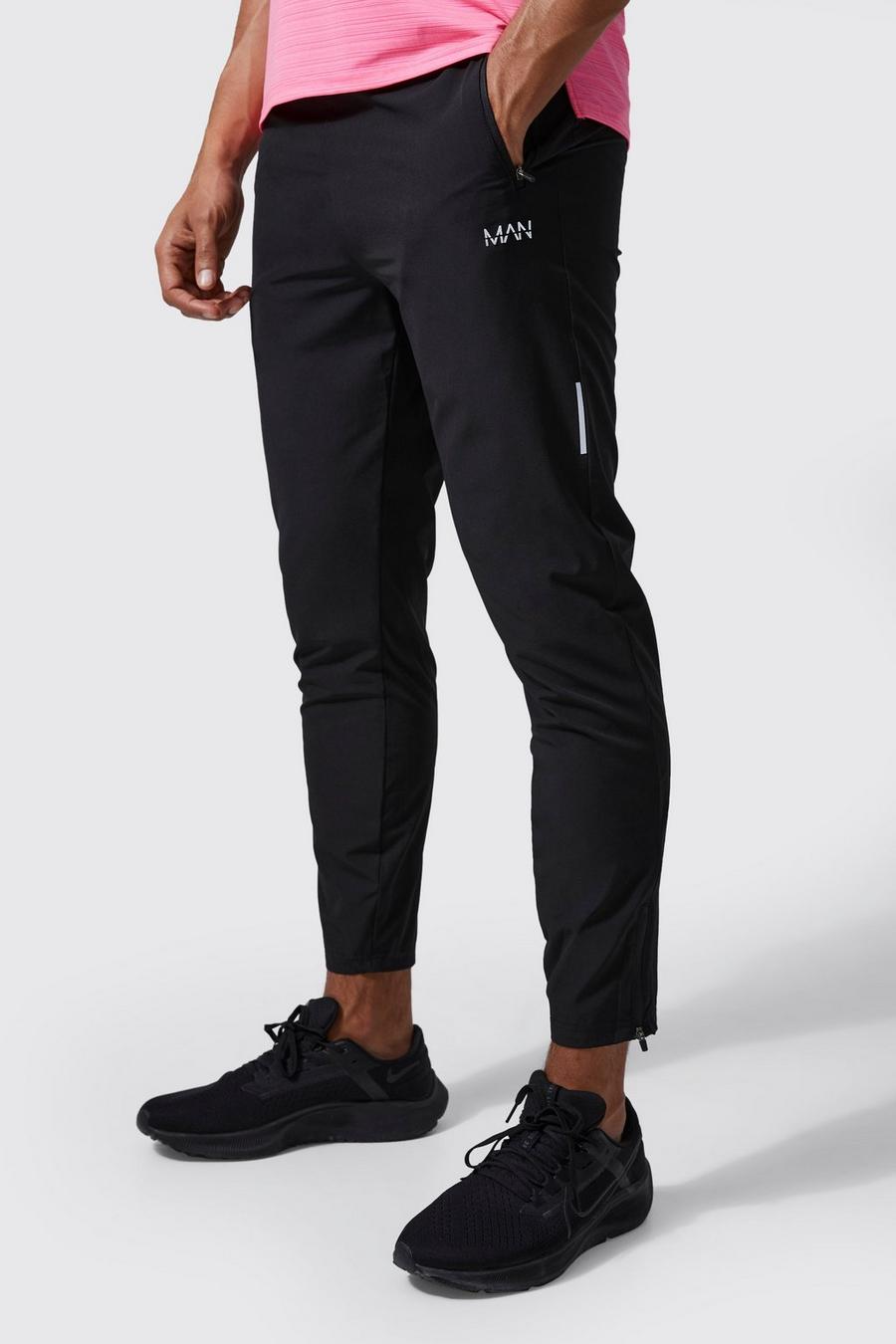Pantaloni tuta leggeri Man Active per alta performance, Black image number 1