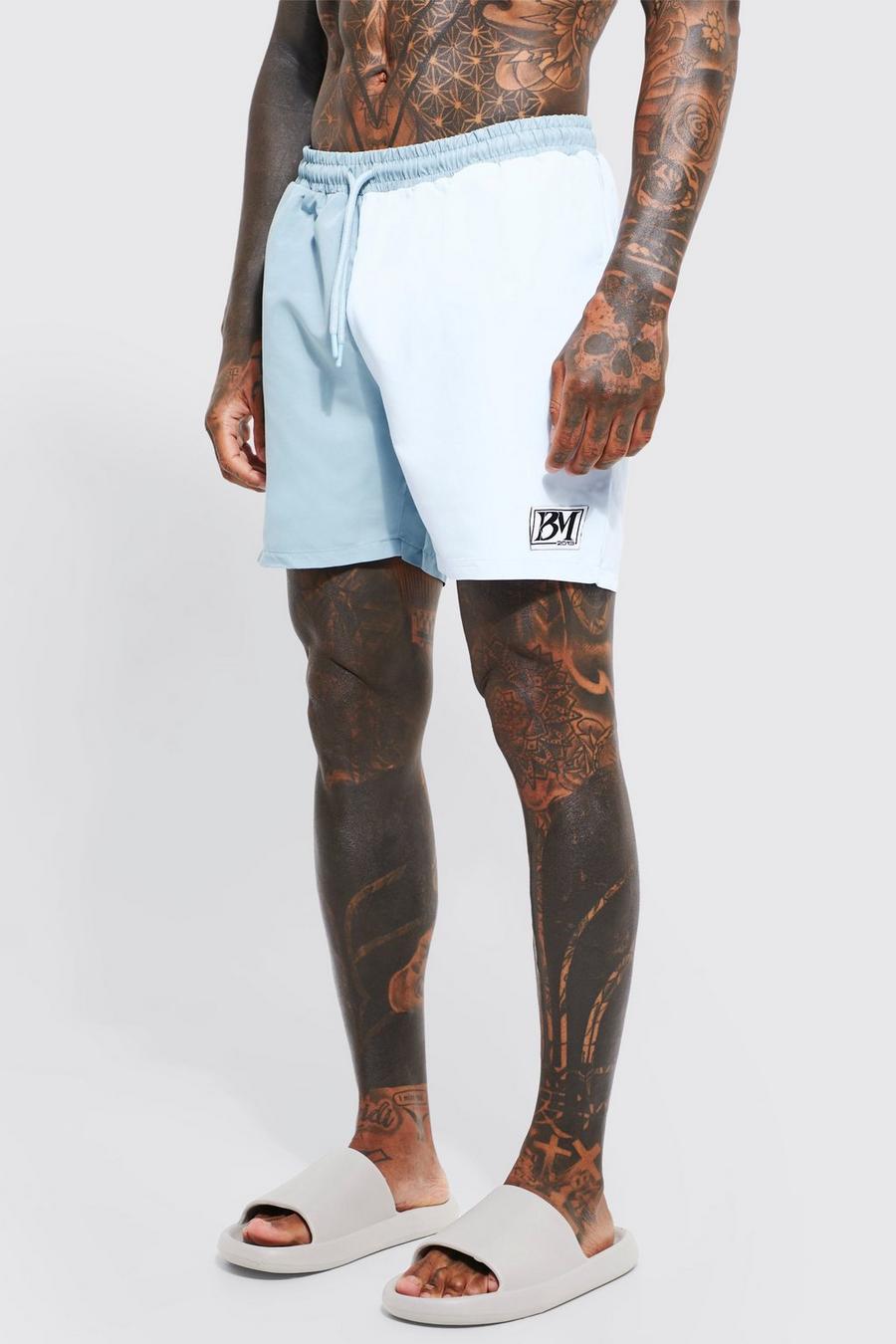 Blue Mid Length Spliced Man Swim Shorts image number 1
