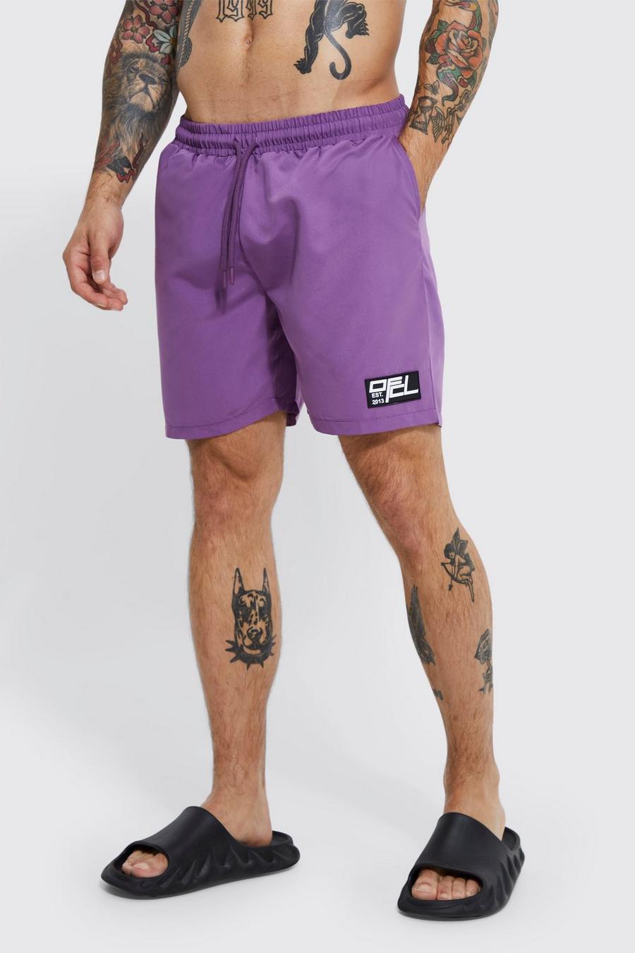 Purple Mid Length Rubber Tab Swim Shorts