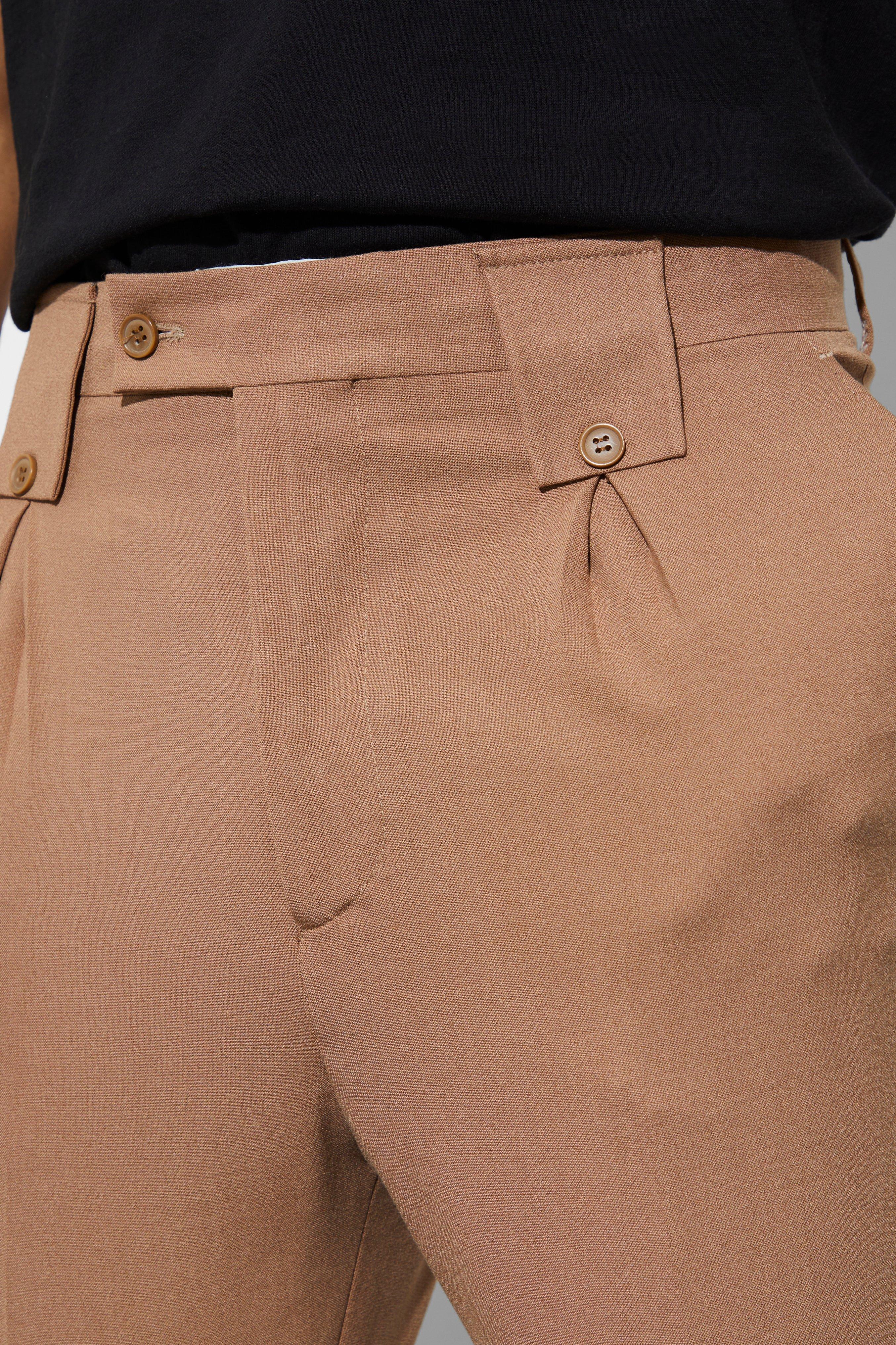 Trouser belt outlet loops