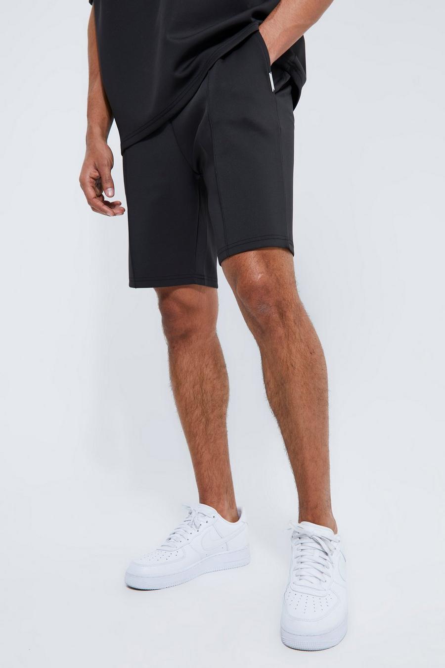 Black svart Mellanlånga baggy shorts med dekorativa veck
