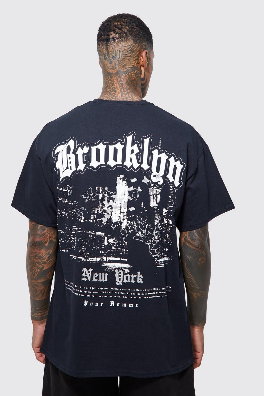 Camiseta oversize con estampado gráfico reflectante de ciudad en la espalda, Black negro image number 1