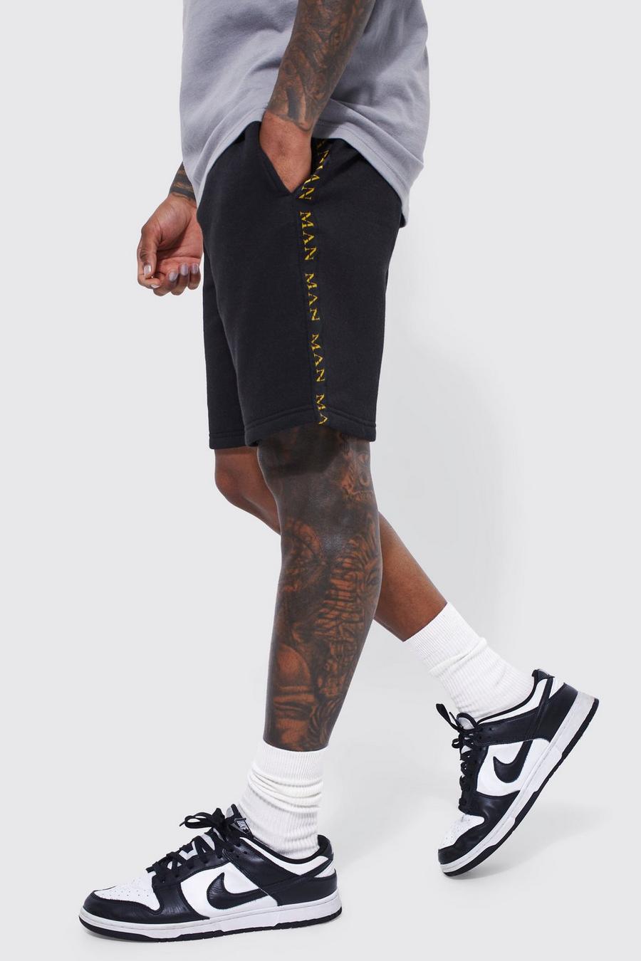 Black MAN Gold Slim fit shorts med kantband image number 1