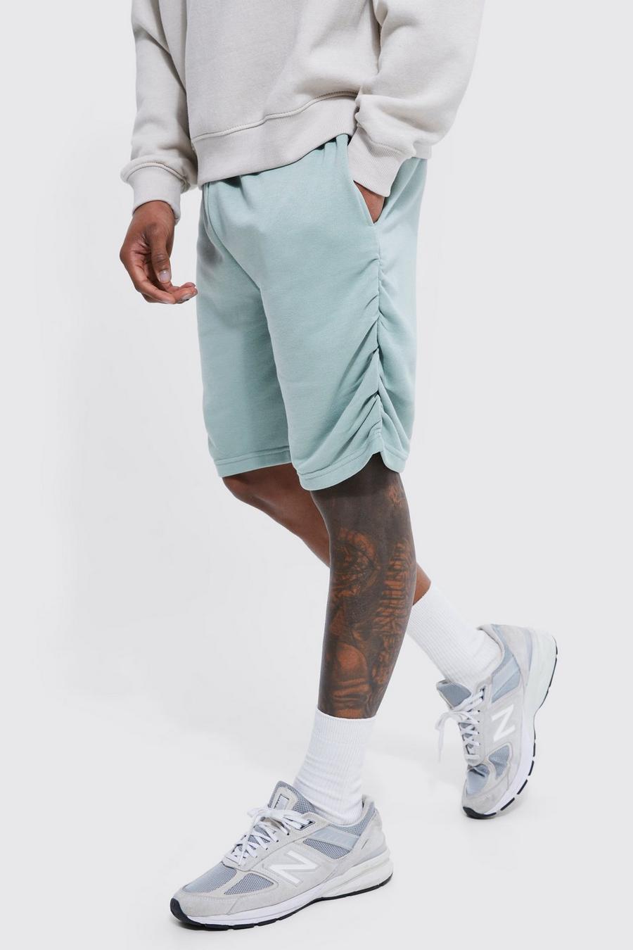 Dusty green Shorts i slim fit med rynkade sidor