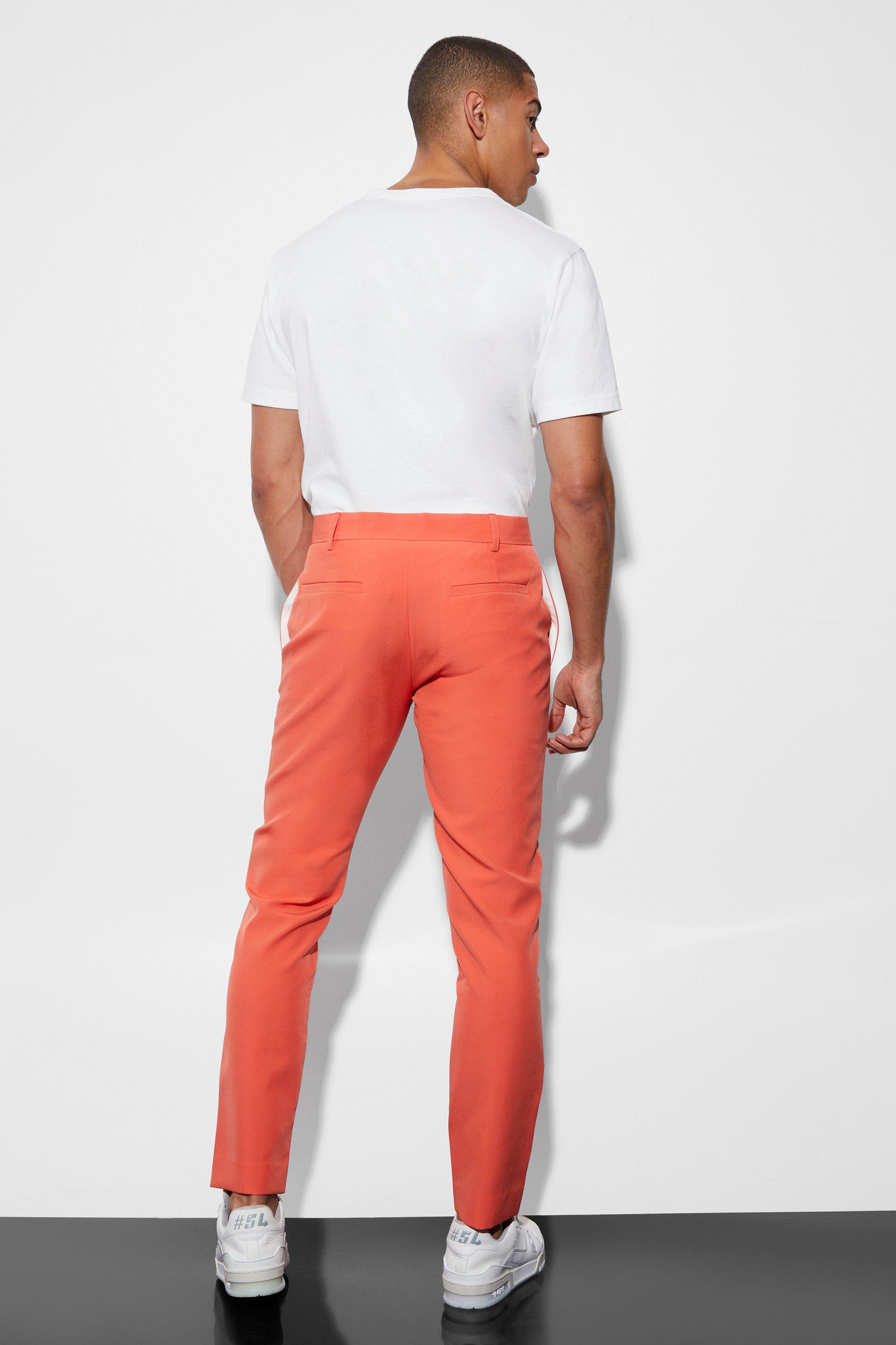 Orange store skinny trousers