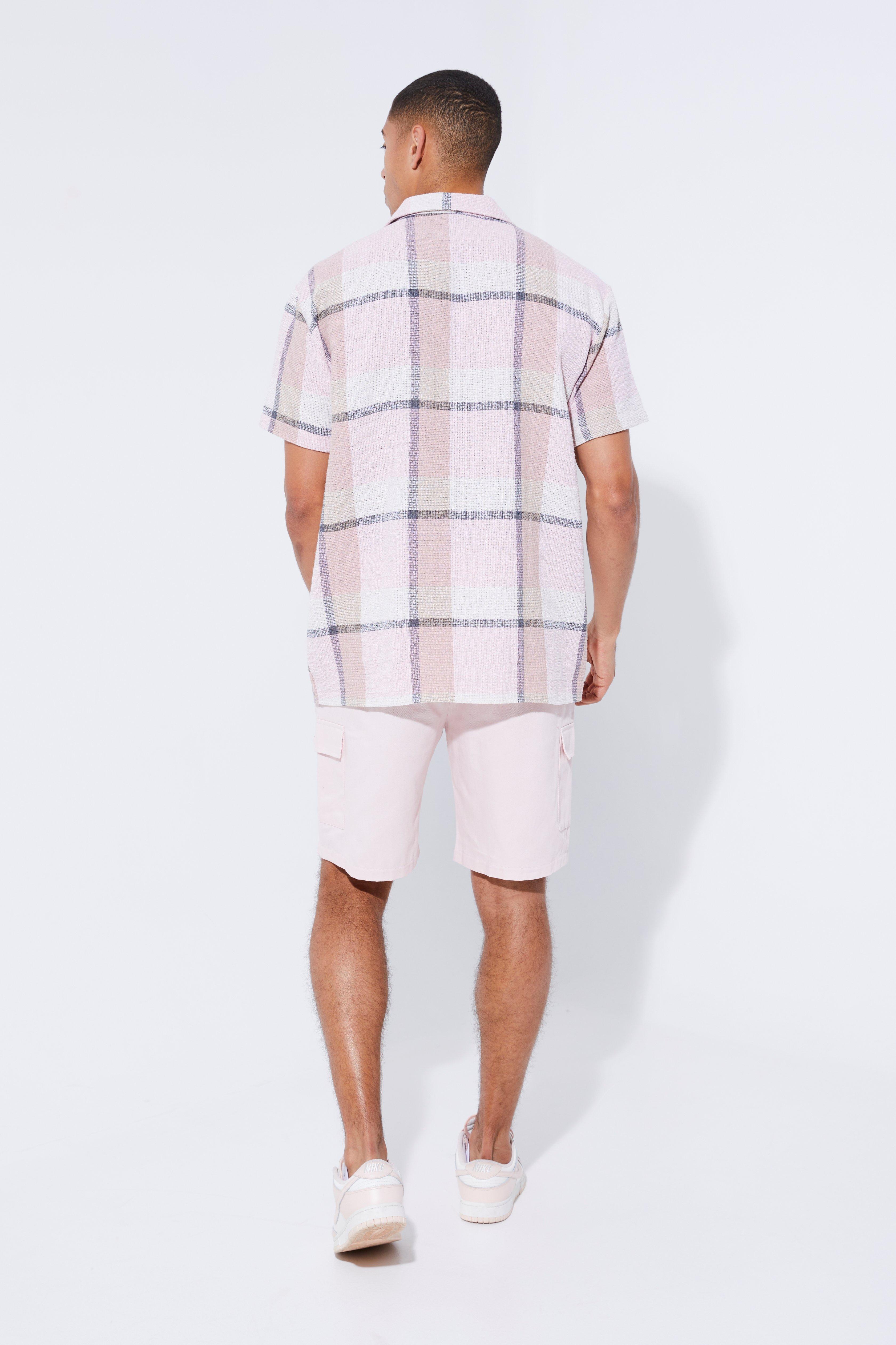 White nike shirt hot sale with pink check