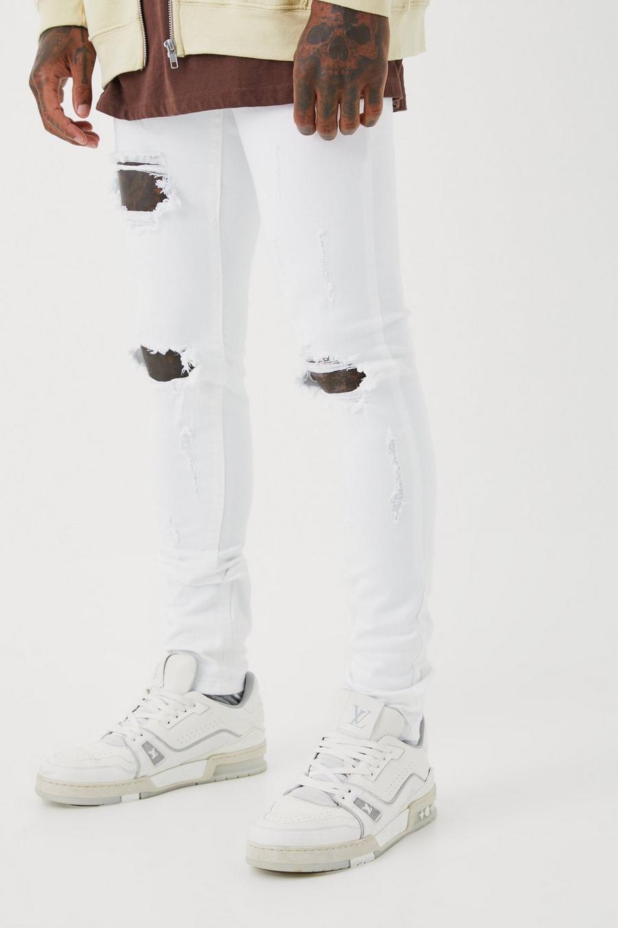 White Super Skinny Stretch Multi Rip Stacked Jeans
