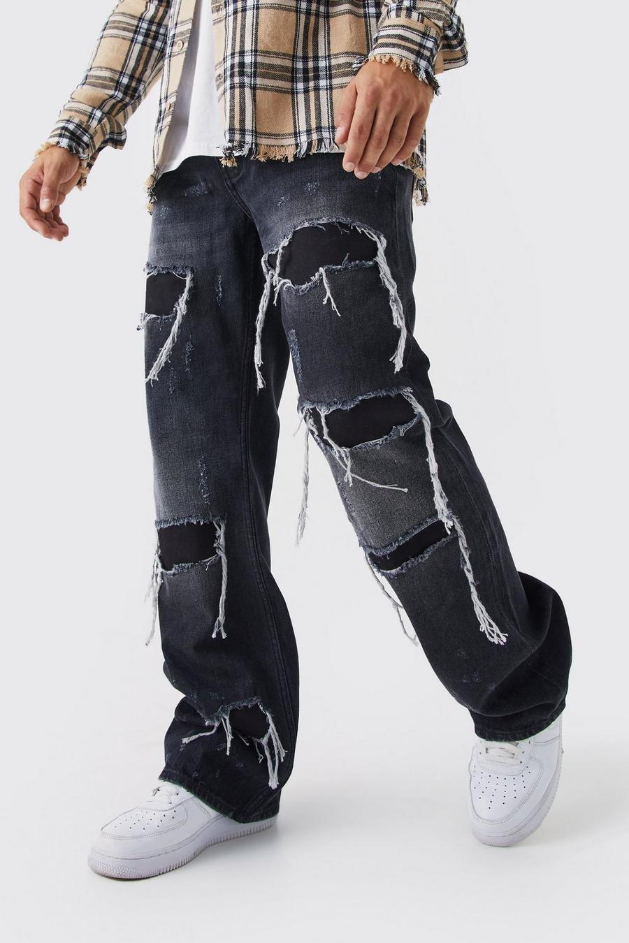 Jeans rilassati in denim rigido a zampa con inserti e strappi, Washed black image number 1