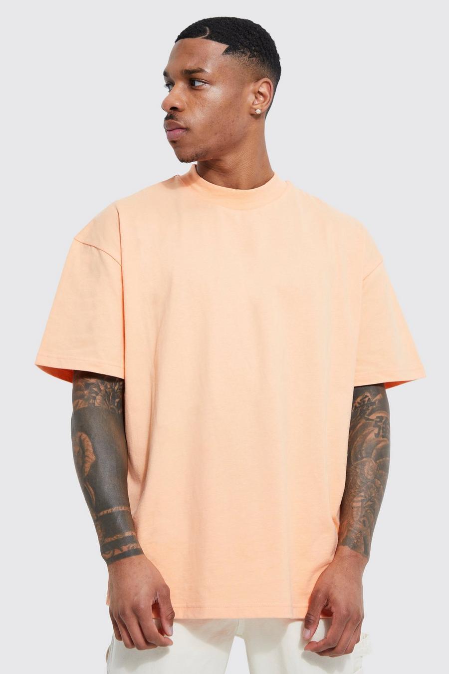 Pale orange Oversize t-shirt med hög halsmudd image number 1