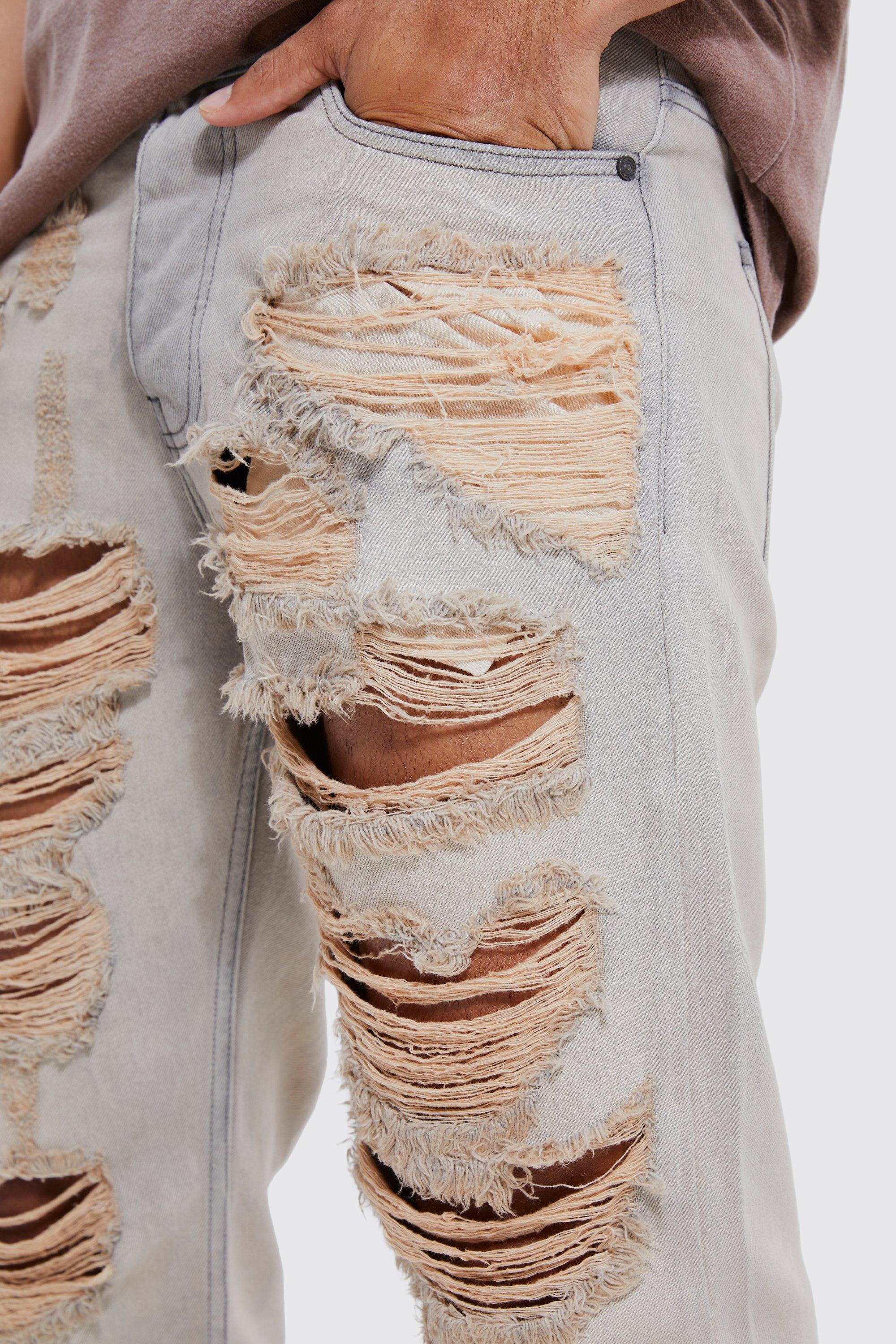 White ripped hot sale levi jeans