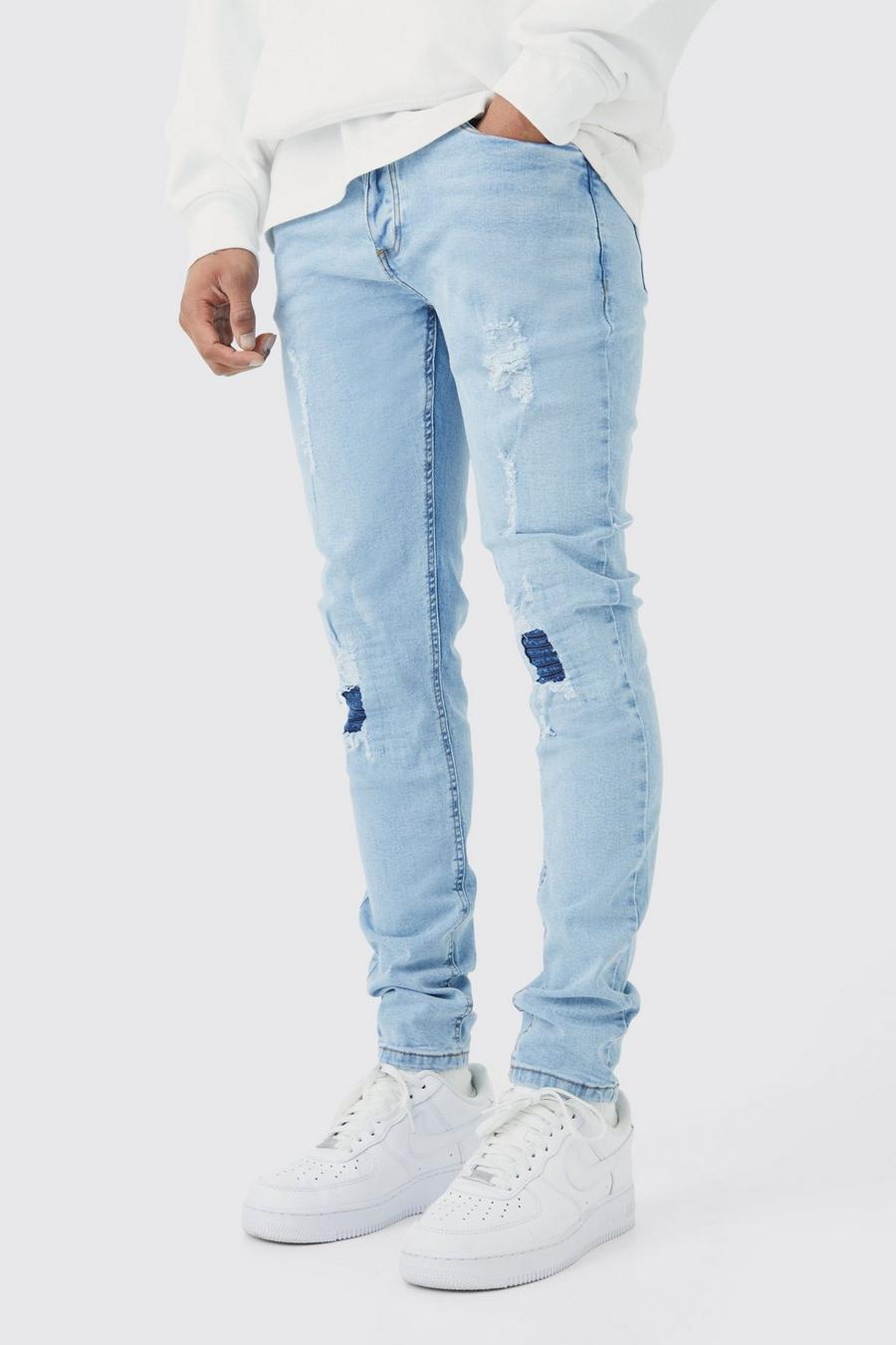 Ice blue Slitna skinny jeans med stretch och lagningar
