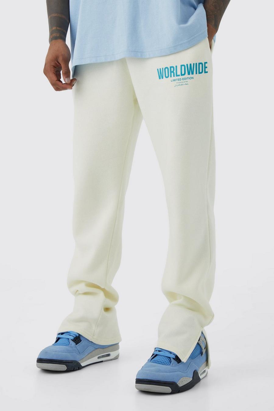 Pantaloni tuta Worldwide con stampa di testo e spacco sul fondo, Ecru image number 1