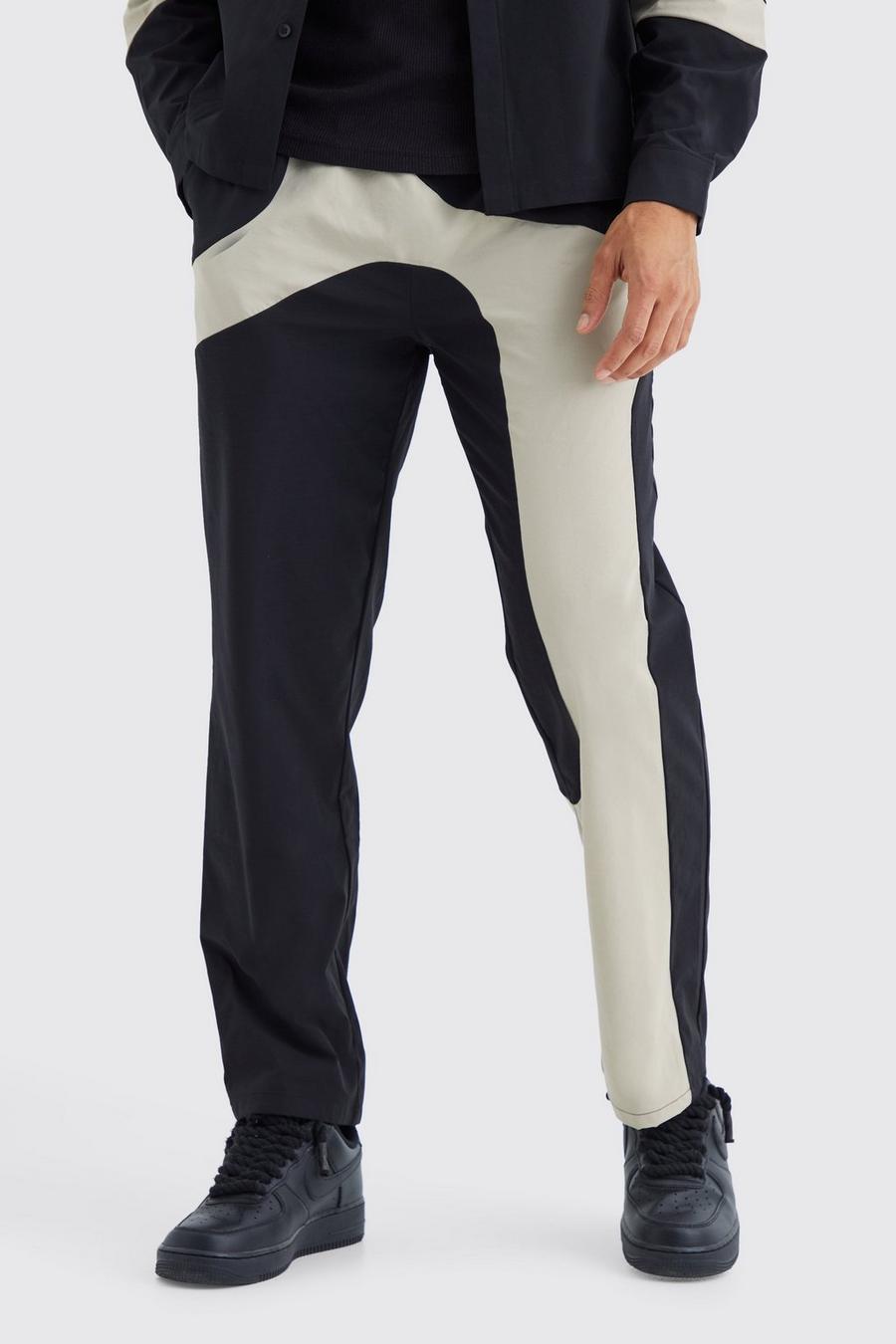 Pantalón recto con cintura elástica y panel técnico, Black image number 1