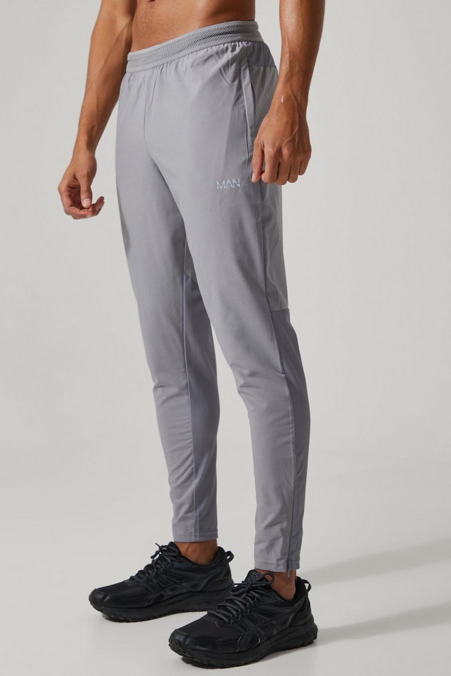Pantalón deportivo MAN Active resistente con cremallera en los bolsillos, Grey image number 1