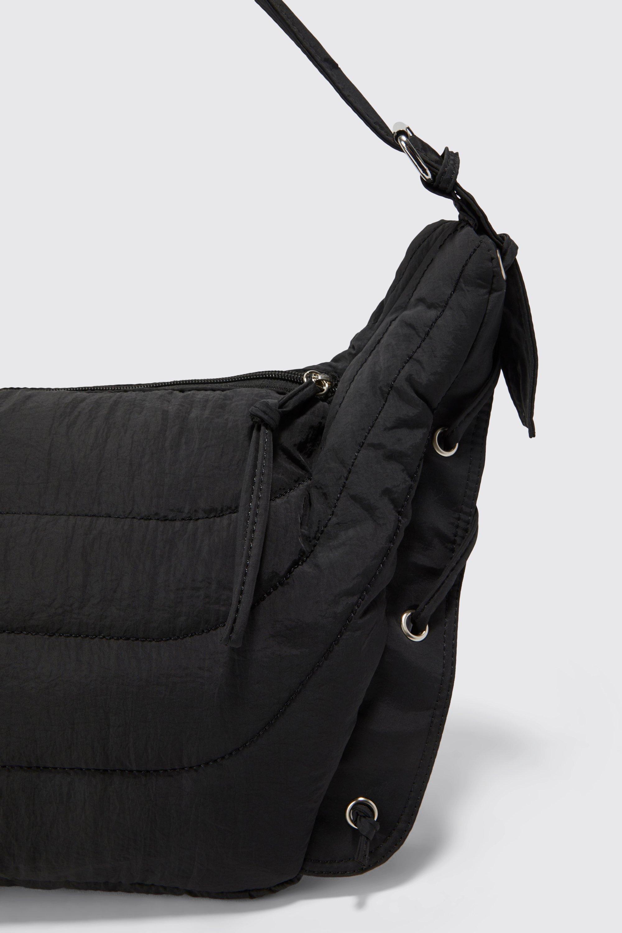 Black quilted sling online bag