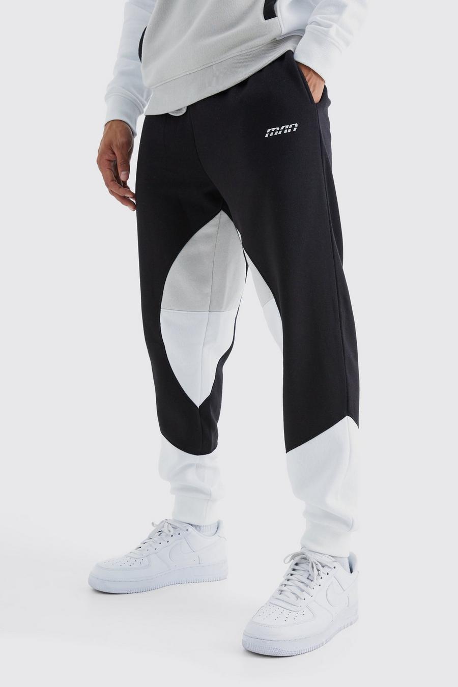 Pantaloni tuta Man a blocchi di colore con pannelli, Black image number 1