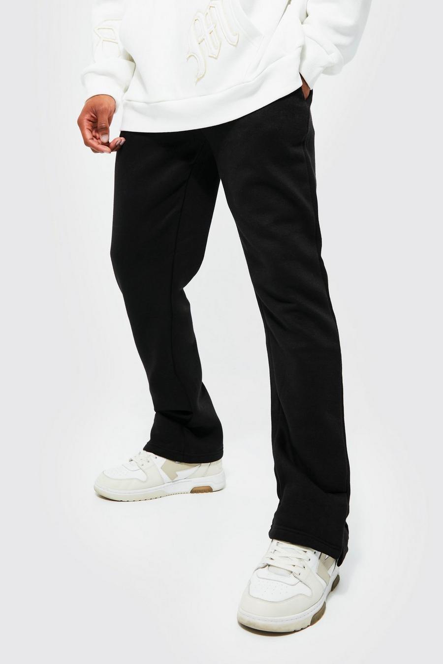 Pantalón deportivo MAN con abertura en el bajo, Black image number 1