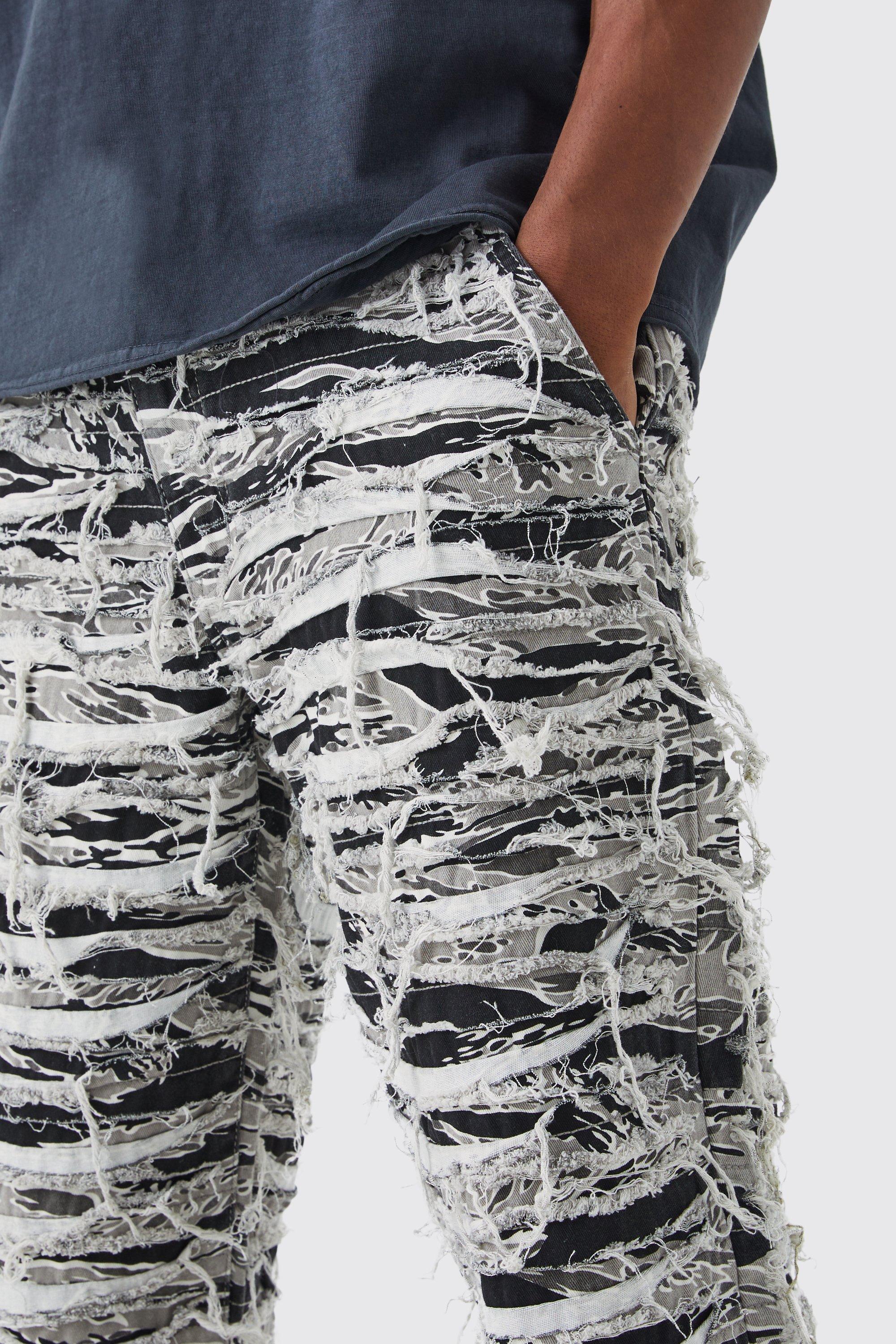 Relaxed Heavily Distressed Camo Pants boohoo USA