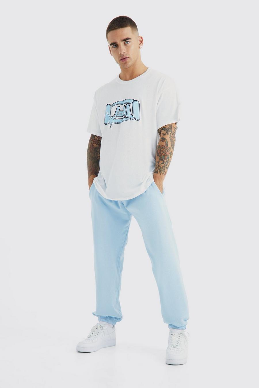 Conjunto oversize MAN de pantalón deportivo y camiseta con estampado gráfico, Light blue image number 1