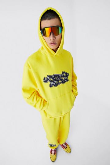 Worldwide Graffiti Oversized Hooded Tracksuit yellow