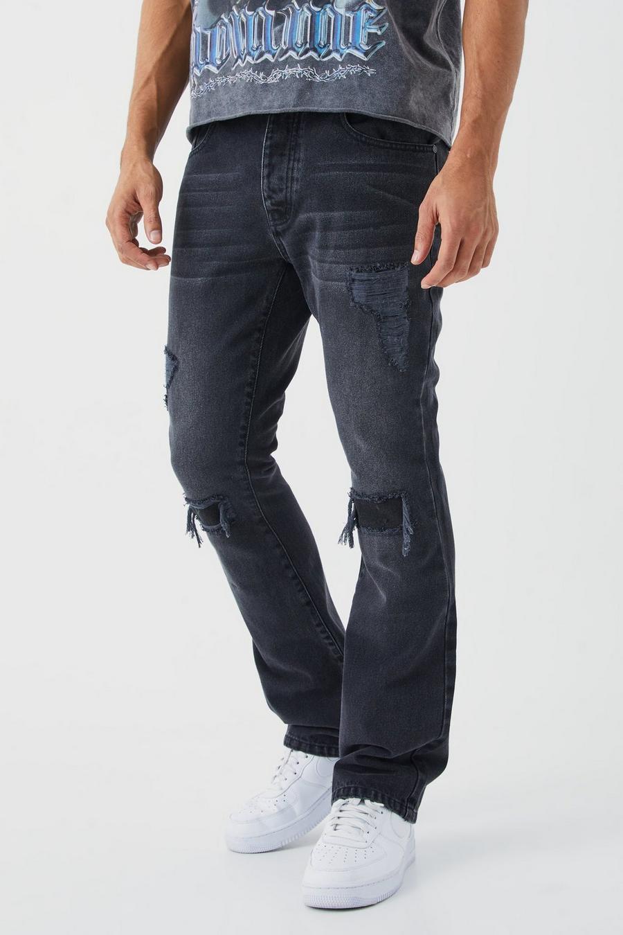 Jeans a zampa Slim Fit con strappi & rattoppi, Washed black