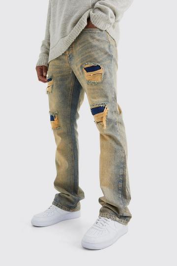 Slim Flare Rigid Multi Rip & Repair Jean antique wash