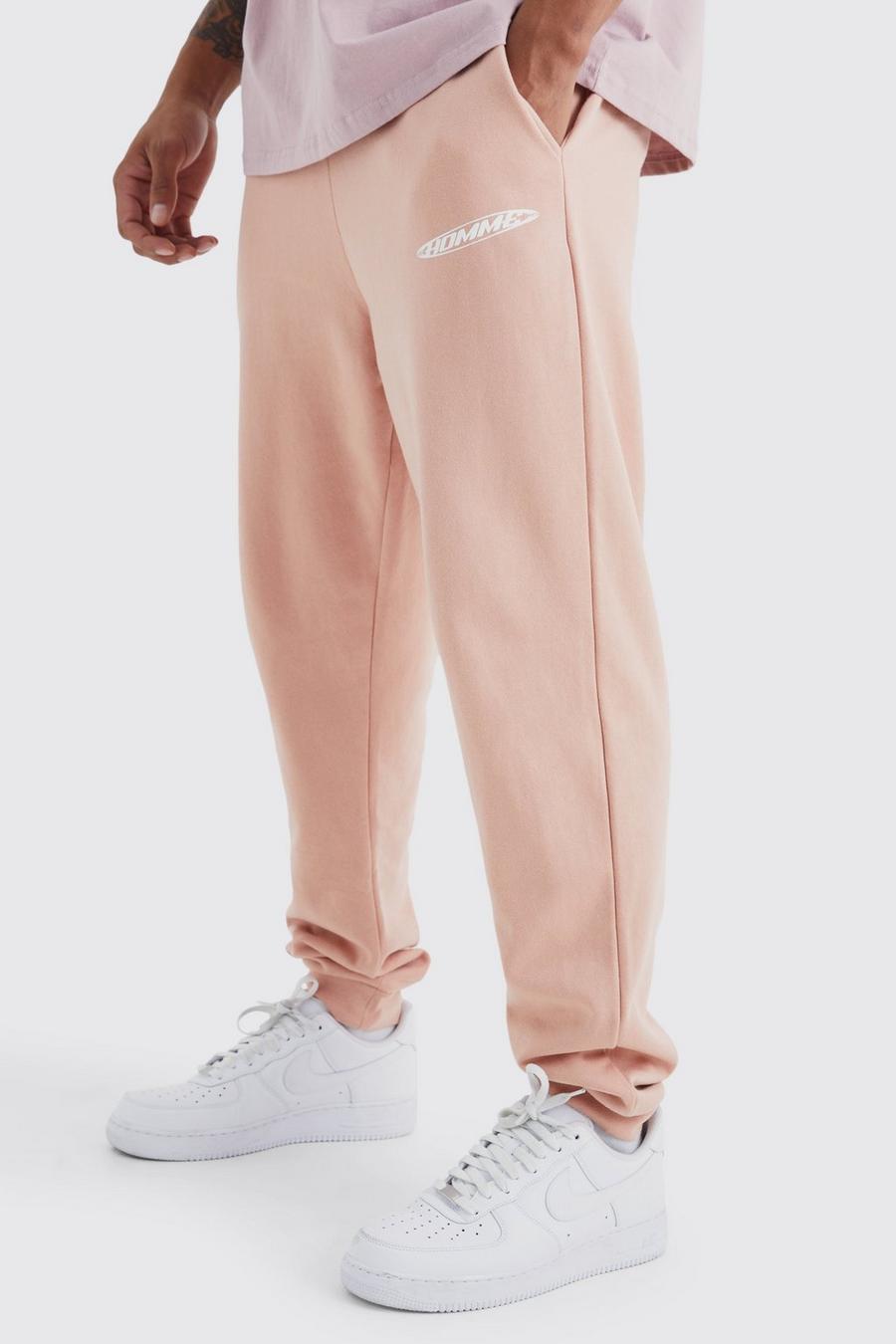 Pantalón deportivo oversize con estampado gráfico Homme, Dusty pink image number 1