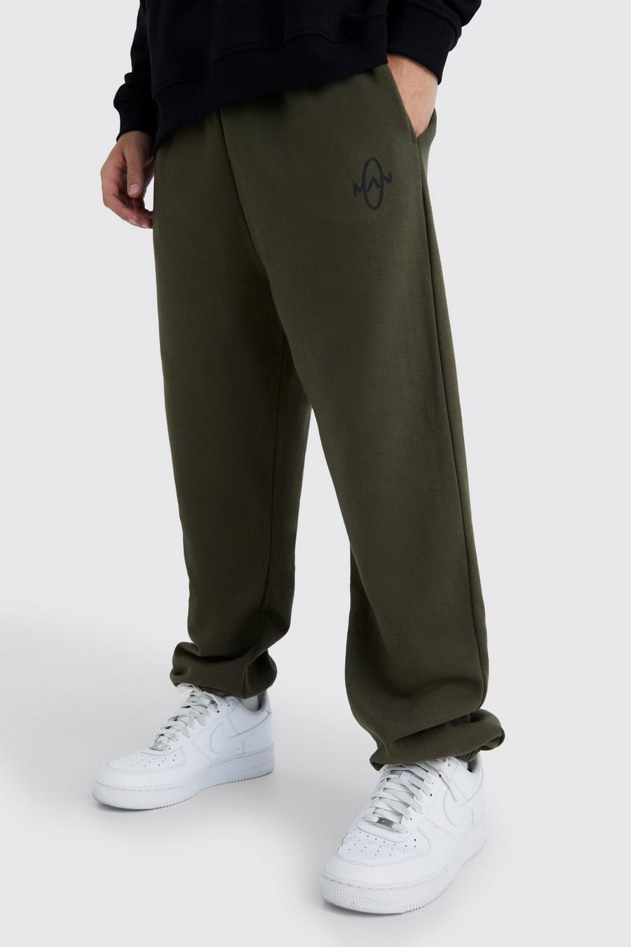 Pantalón deportivo MAN oversize con estampado de círculos en relieve, Khaki image number 1