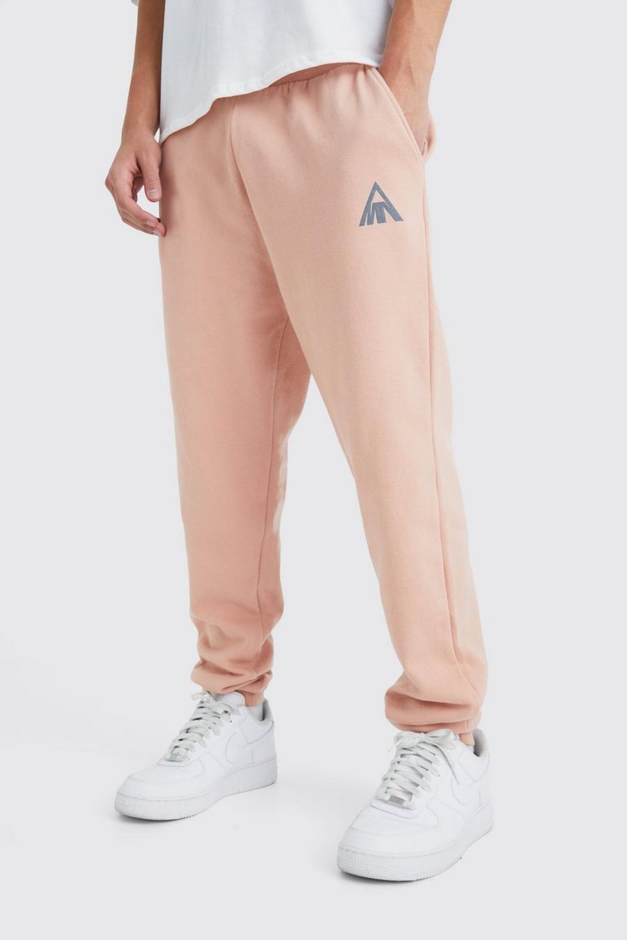 Pantalón deportivo MAN oversize de triángulo, Dusty pink image number 1