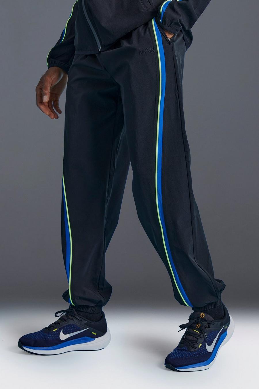 Man Active Colorblock Jogginghose, Black image number 1