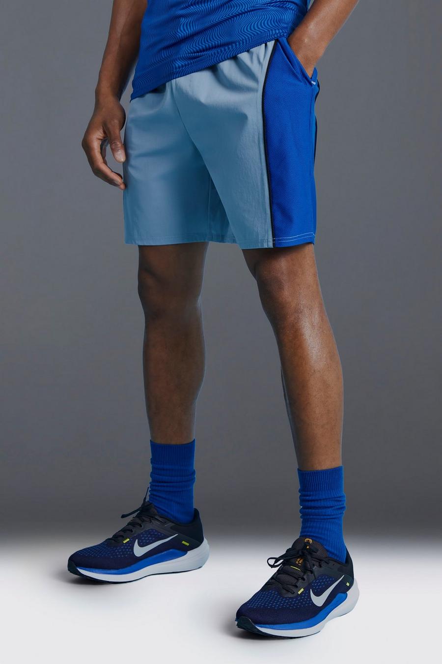 Pantaloncini Man Active a blocchi di colore con pannelli, Light blue image number 1