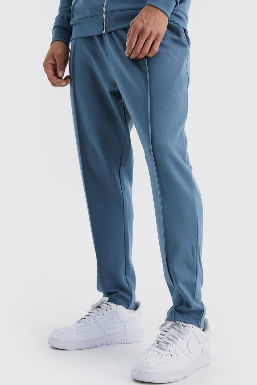 Pantaloni tuta alla caviglia affusolati Slim Fit con nervature e vita elasticizzata, Slate blue image number 1