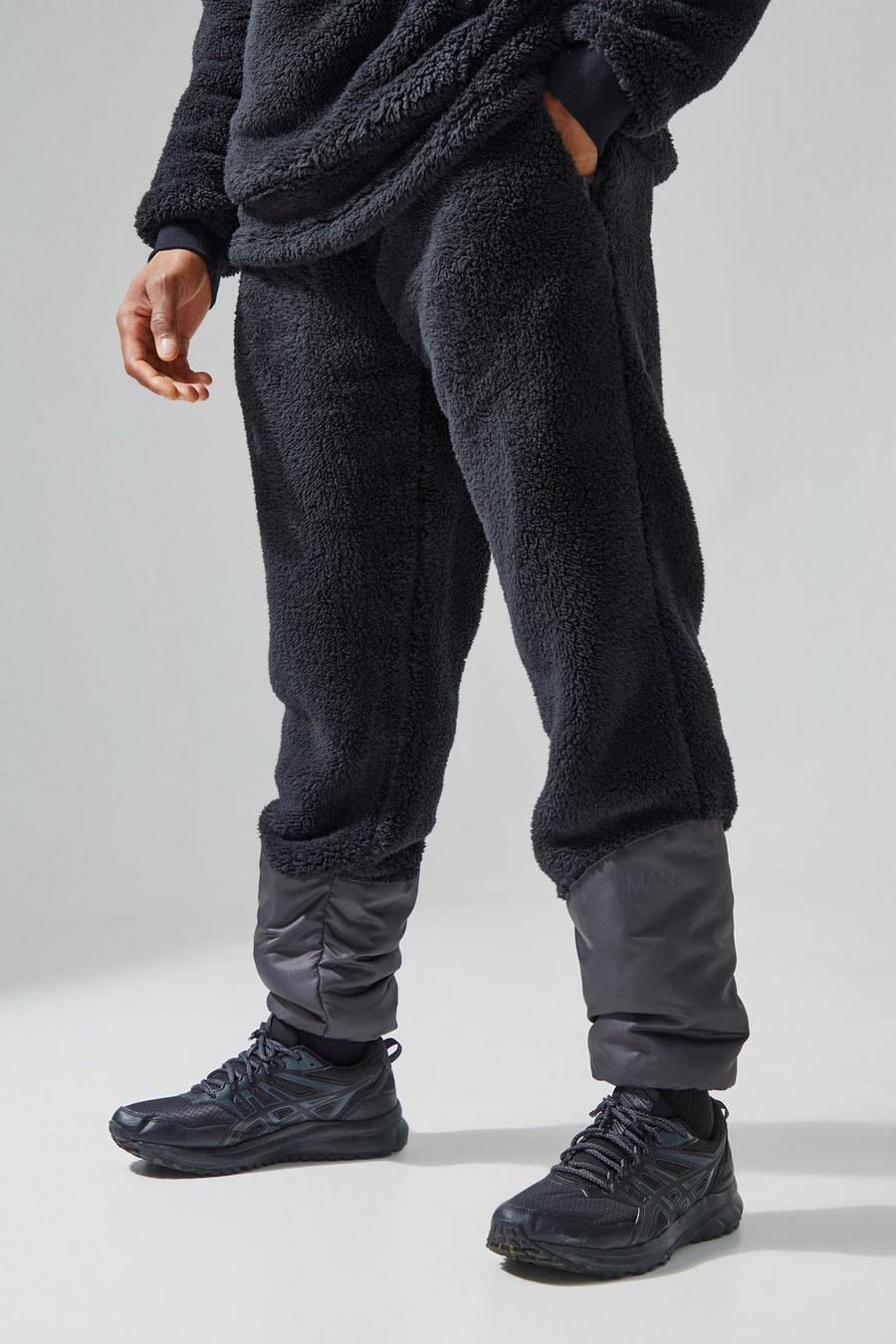 Pantaloni tuta rilassati in pile borg con polsini elasticizzati, Black image number 1