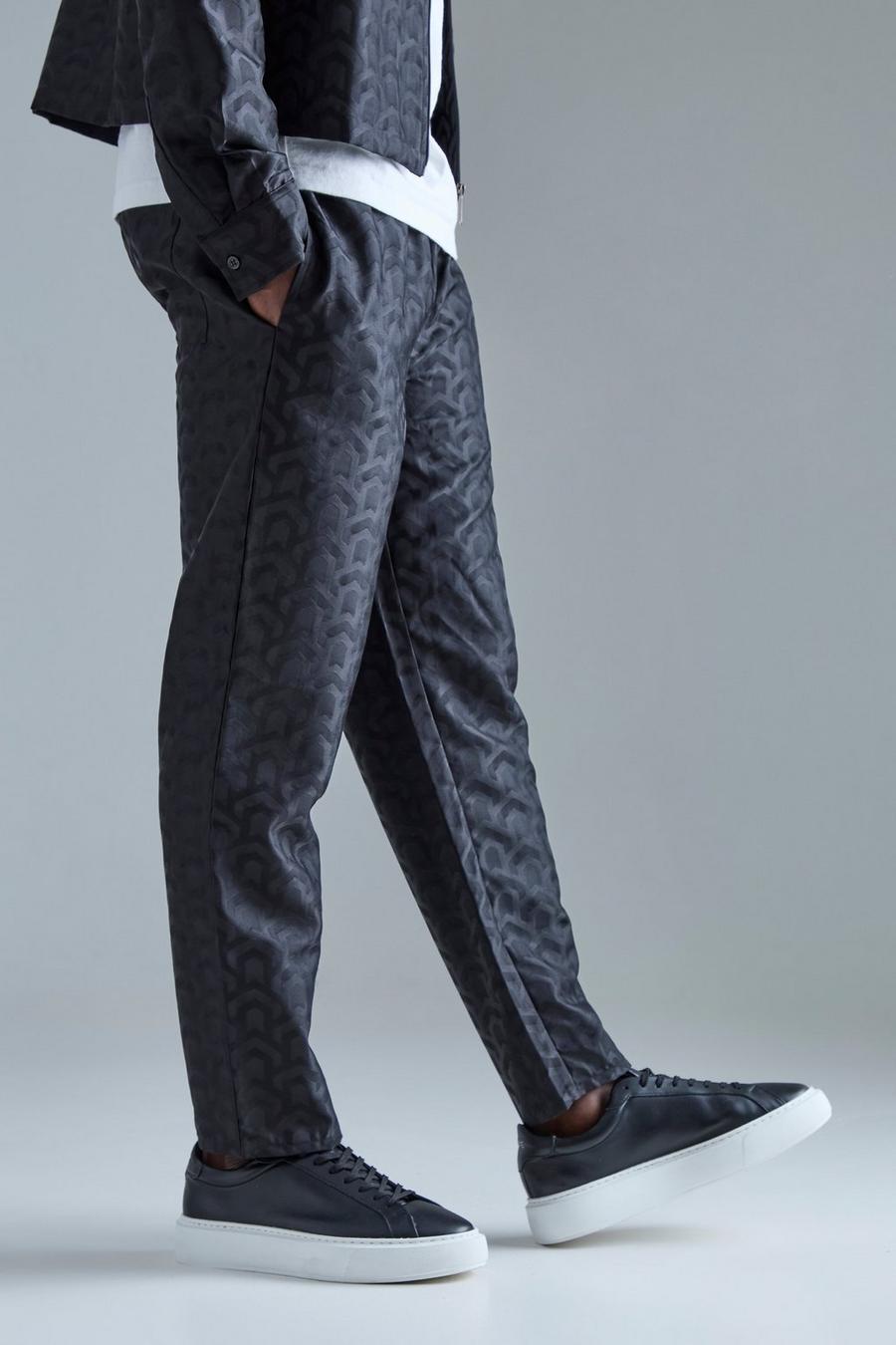 Pantalón ajustado texturizado con estampado geométrico, Black