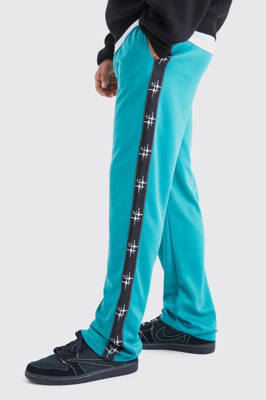 Pantalón deportivo oversize de tejido por urdimbre con franja lateral, Teal image number 1
