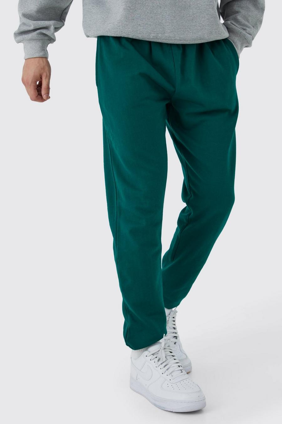 Essentials - Pantalón deportivo de vellón para hombre (disponible en  tallas para hombres altos y grandes)