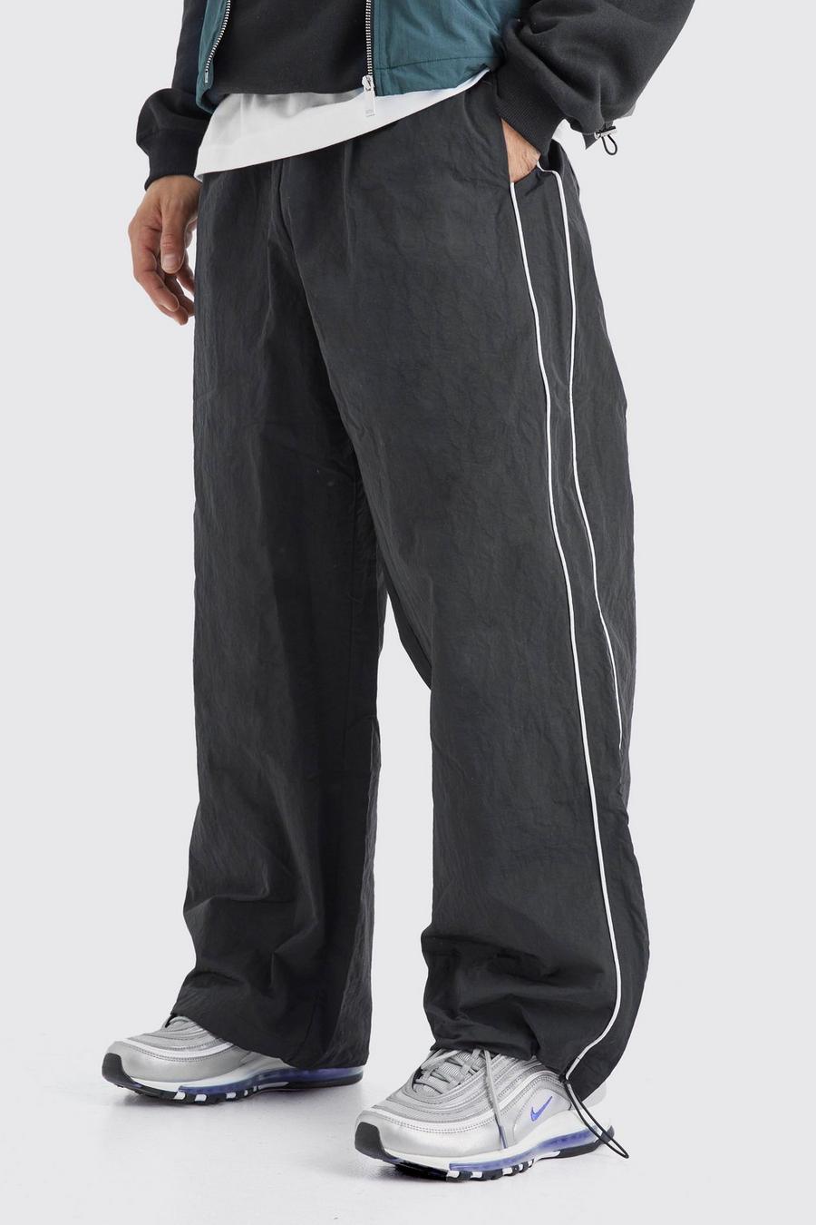 Pantalones bombachos oversize con línea lateral, Black image number 1