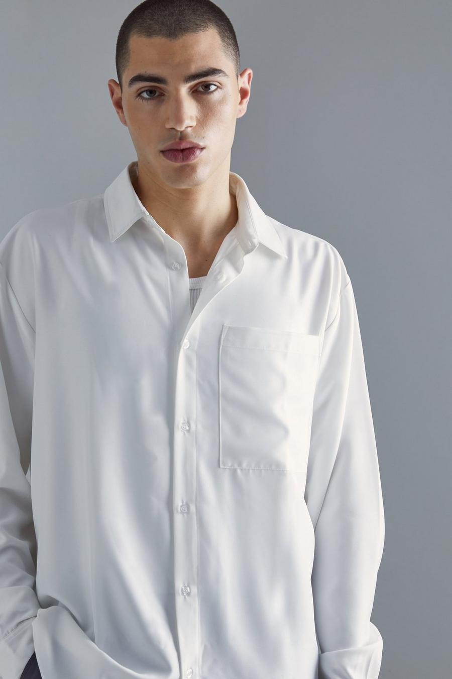 White Oversize skjorta i twill med fickor image number 1