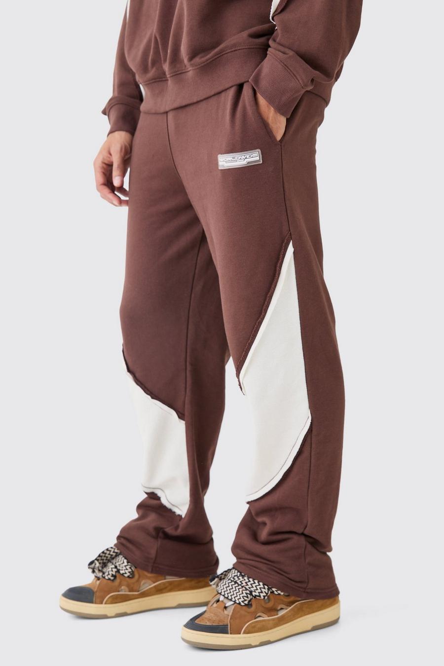 Pantalón deportivo holgado con panel y bajo sin acabar, Chocolate image number 1