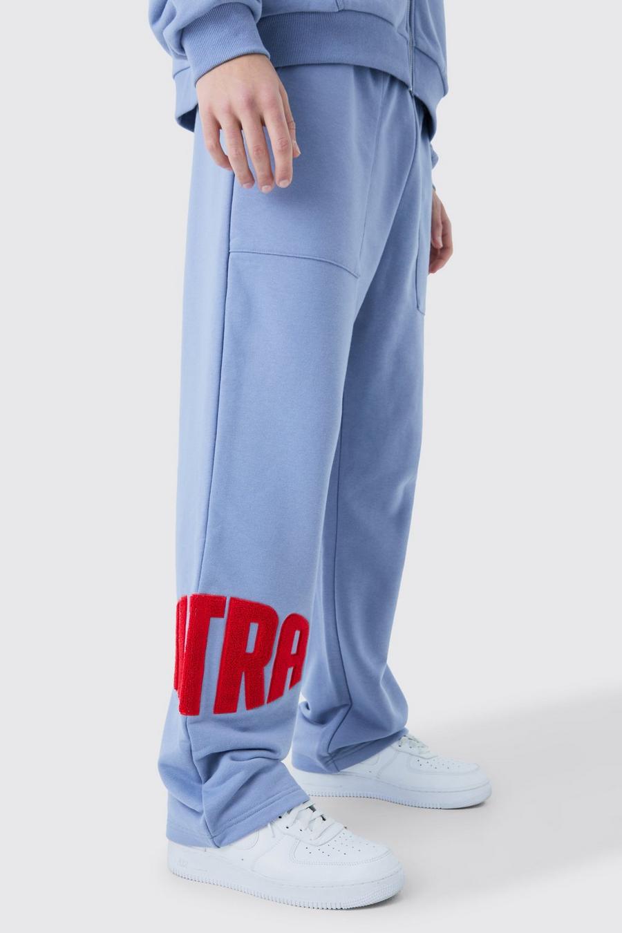 Pantaloni tuta dritti in pile borg con applique, Slate blue