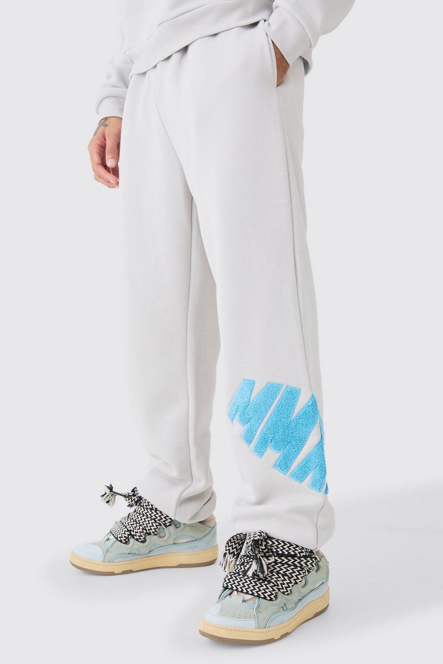 Pantalón deportivo oversize de borreguito con apliques, Light grey