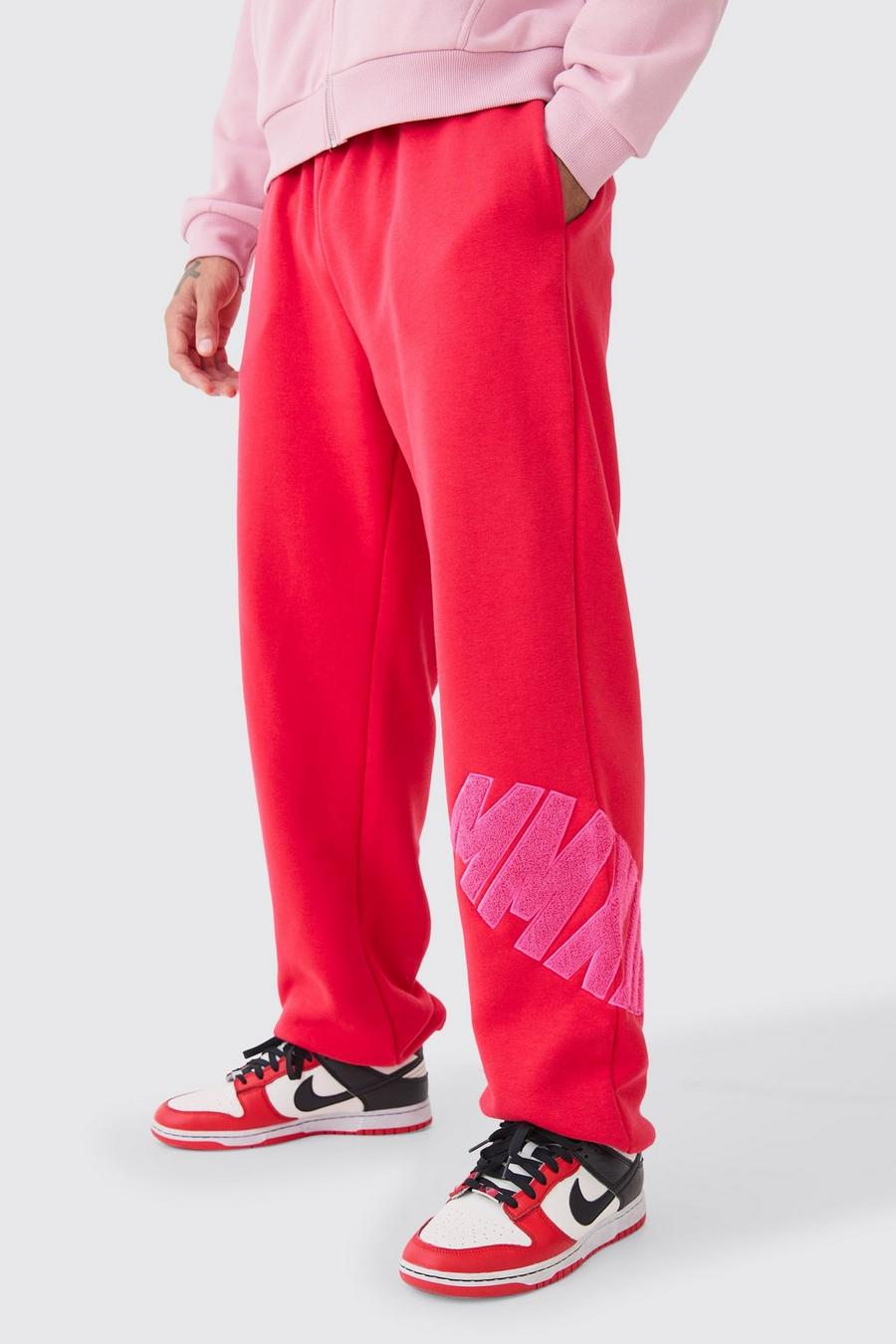 Pantaloni tuta oversize in pile borg con applique, Red