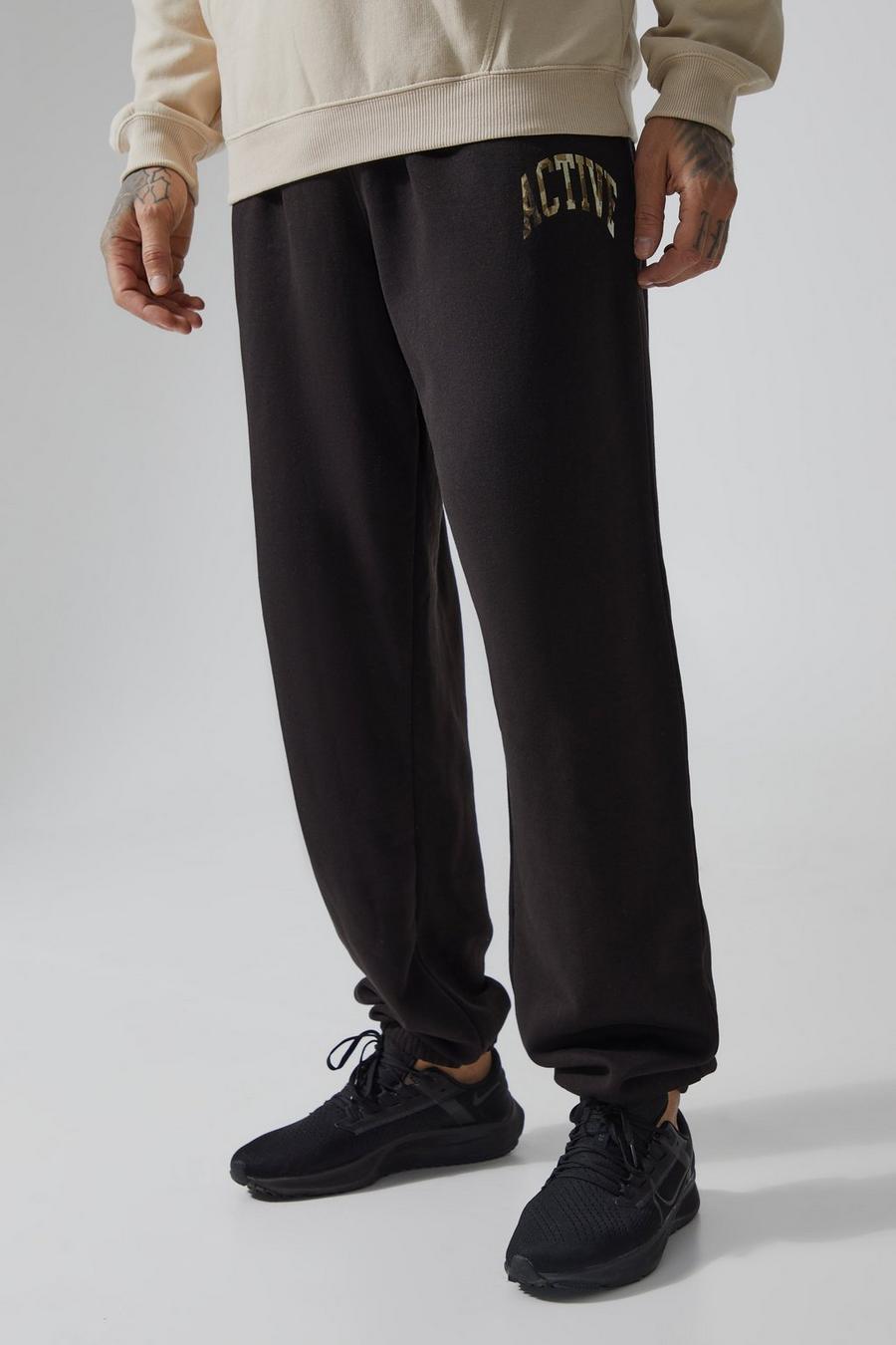 Pantalón deportivo Tall MAN Active oversize con relleno de camuflaje, Black image number 1