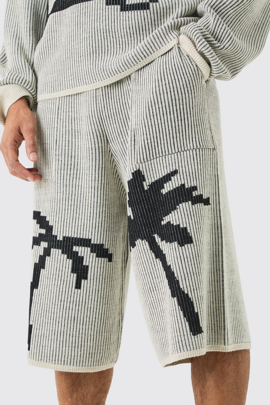 Pantaloni tuta in maglia a coste in jacquard con palme, Stone image number 1