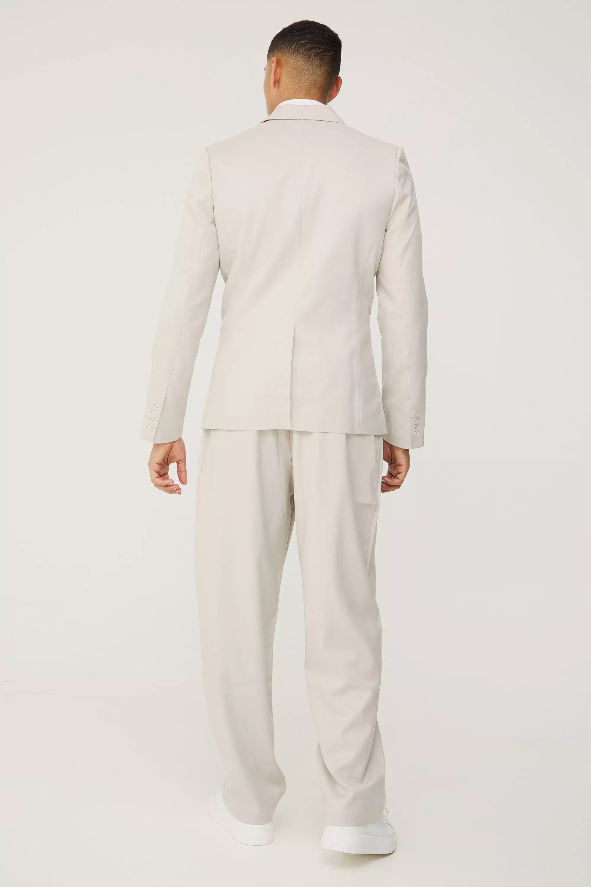 Stone Textured Relaxed Fit Trousers صورة بديلة